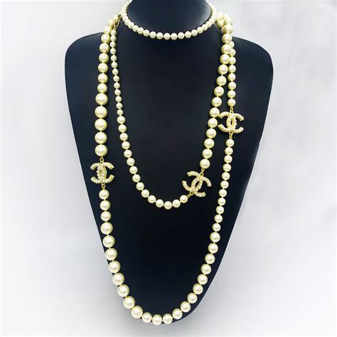 replica chanel long pearl necklace gold|faux chanel long pearl necklace.